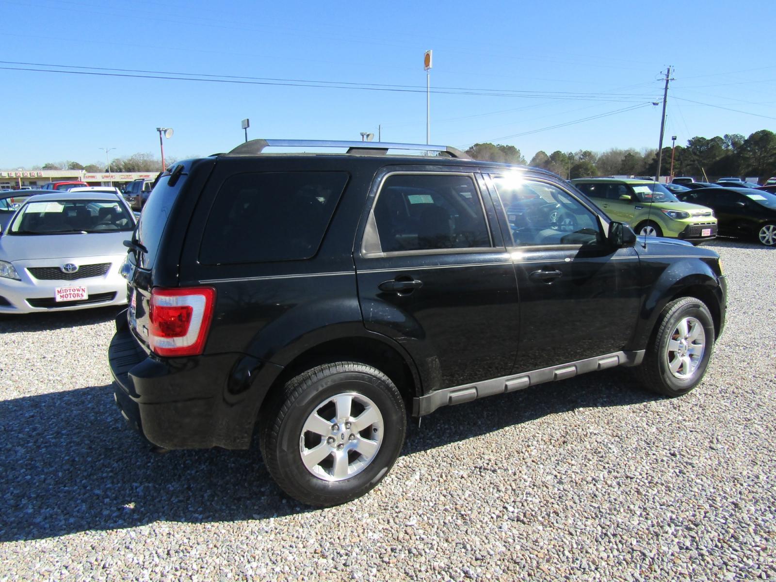 2010 Black Ford Escape Limited FWD (1FMCU0EG8AK) with an 3.0L V6 DOHC 24V engine, Automatic transmission, located at 15016 S Hwy 231, Midland City, AL, 36350, (334) 983-3001, 31.306210, -85.495277 - Photo #7
